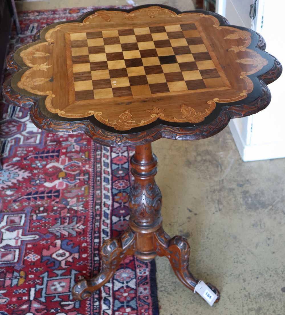 A Victorian carved walnut chess table, 60cm diameter, height 72cm